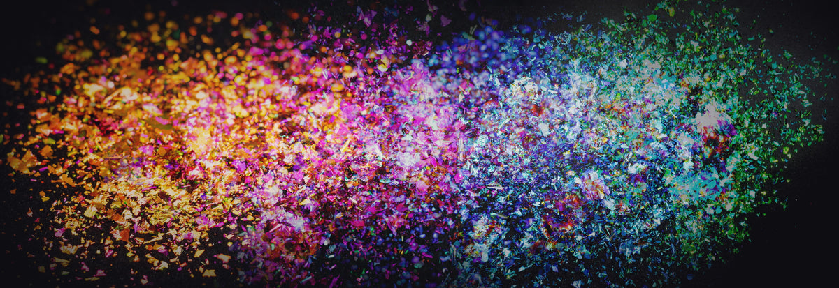 Loose cosmetic pigment scattered on black